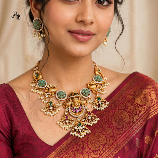 Ornate Antique Gold Lakshmi Temple Jewelry Set with Green Stone Accents