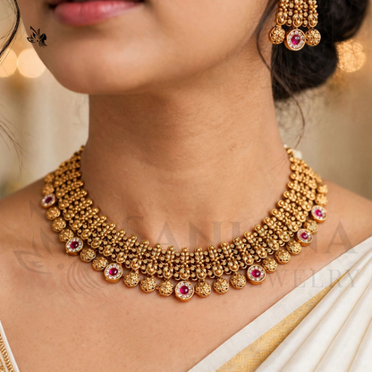 Royal Gold-Plated Lakshmi Choker Necklace Set with Matching Jhumka Earrings