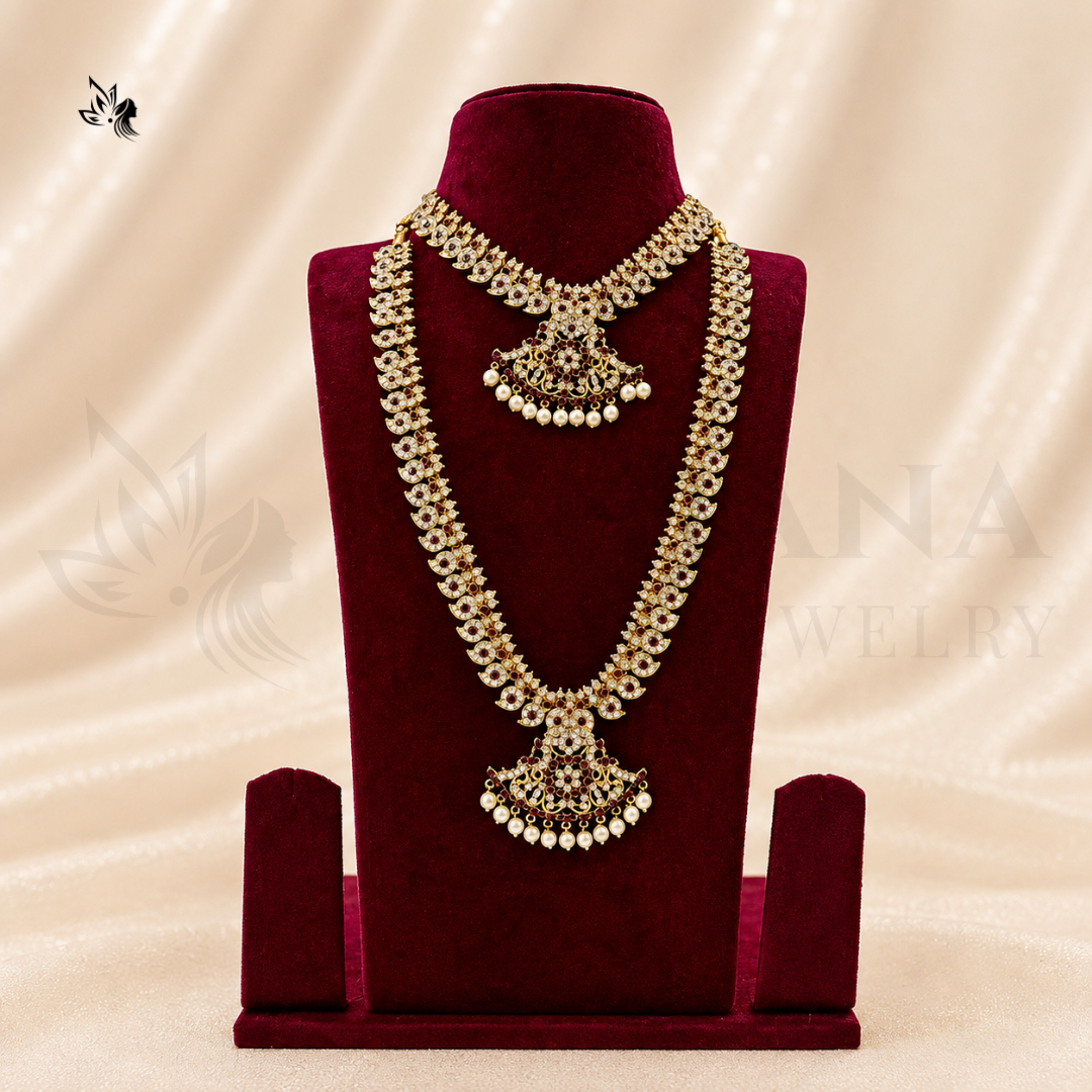 An ornate gold and white Kundan necklace set displayed on a deep red velvet jewelry bust against a beige satin fabric background.