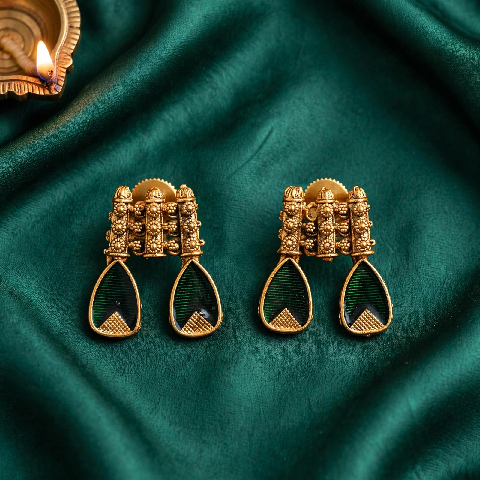 Emerald green palakka temple earrings with antique gold finish