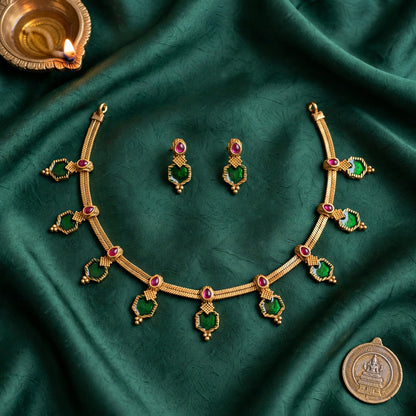Emerald green and ruby stone gold finish necklace set with matching earrings