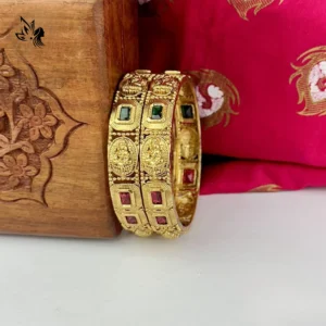 Fine stone‑accent gold bangle